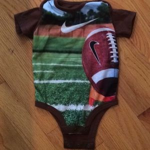 Nike football onesie